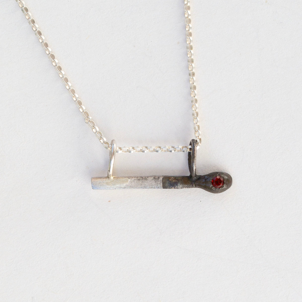 Silver Match 7, Garnet