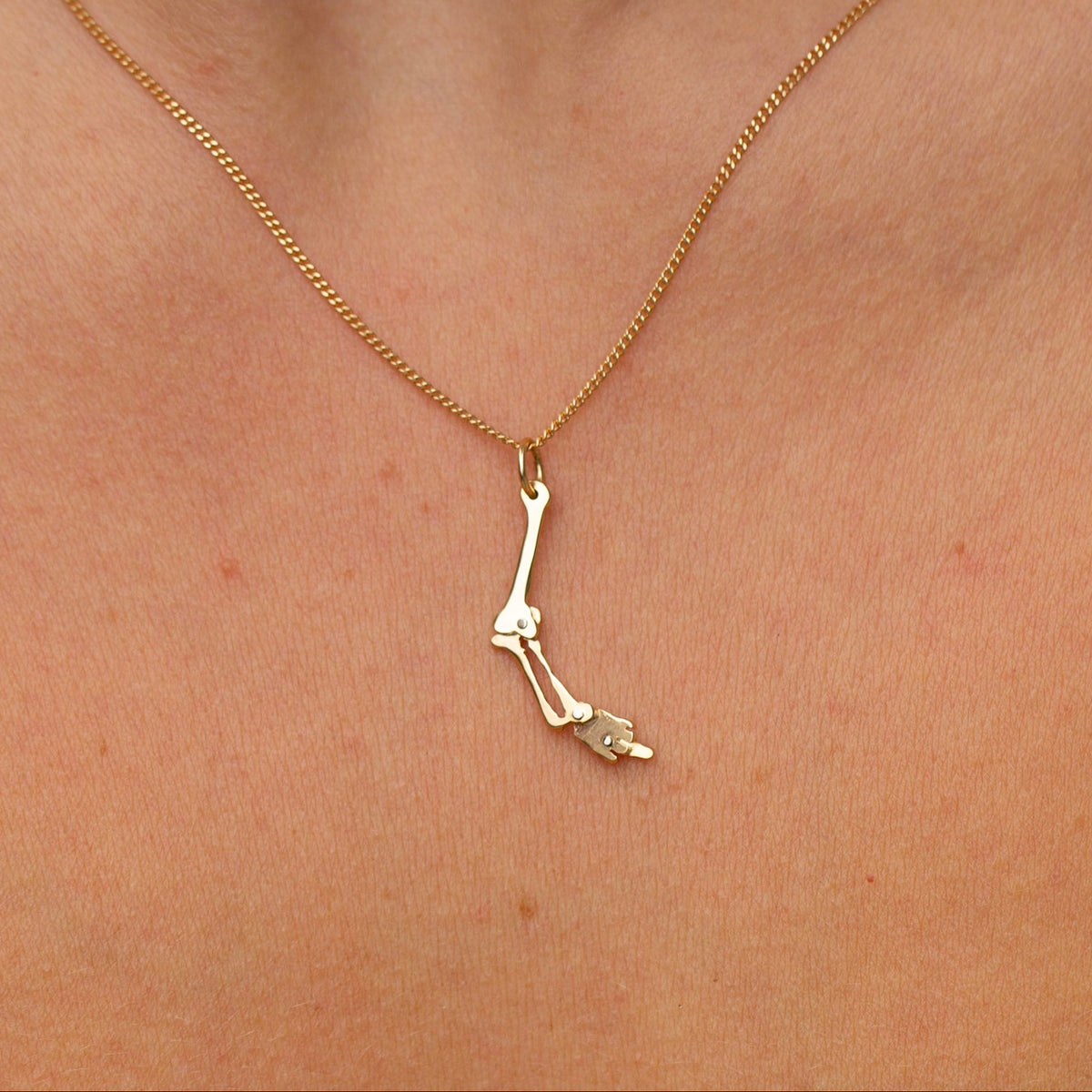 Humerus Charm 5, 14k