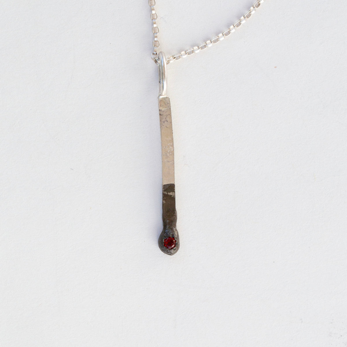 Silver Match 4, Garnet