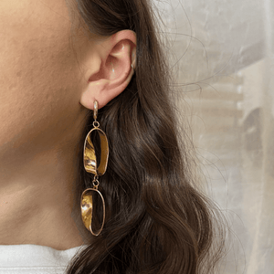 
            
                Load image into Gallery viewer, Asymmetric Ojo hoops
            
        